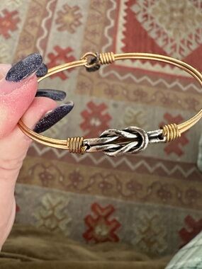 Luca + Danni gold bangle bracelet with silver infinity knot